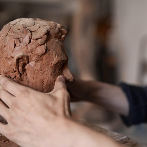 hands-clay-sculpting-side-view